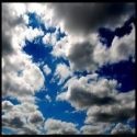 Watching Clouds : Watching as Clouds darken my Life and then disappear into sweet nothings